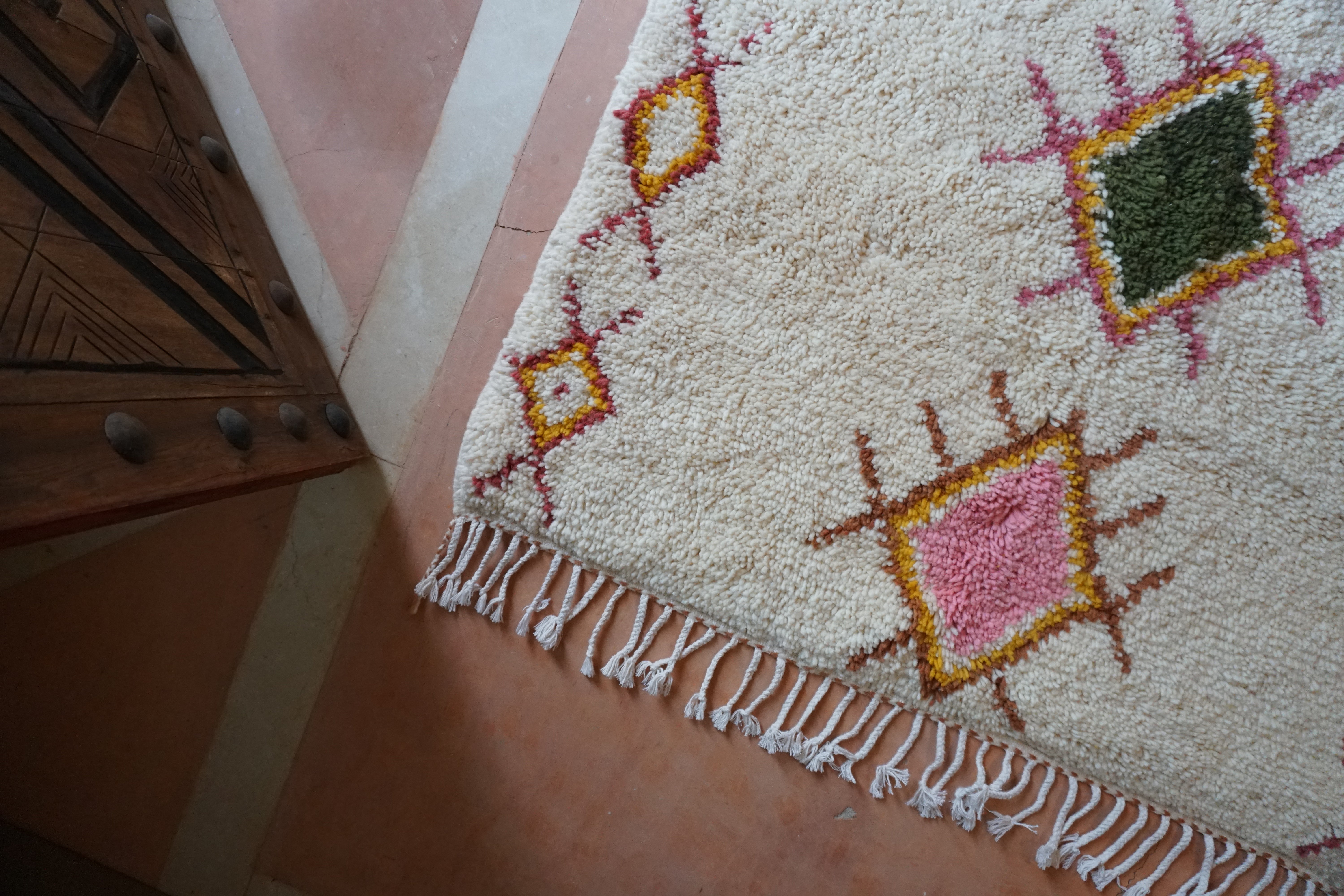 White Moroccan rug with colorful diamonds