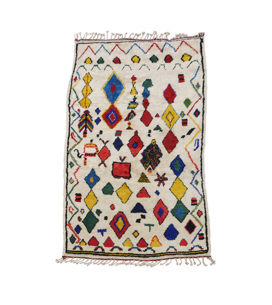 Colorful geometric patterned rug on a white background