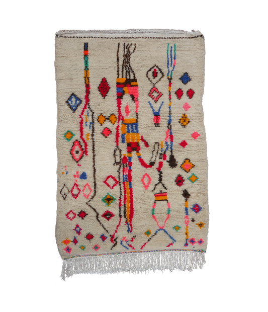 Medium hand knotted azilal rug with bright colorful patterns and fringes on a neutral background