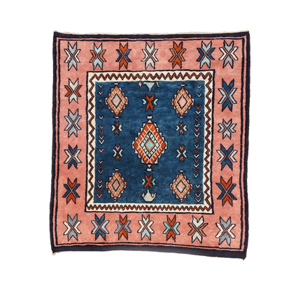 Decorative Moroccan rug with geometric pattern on a white background